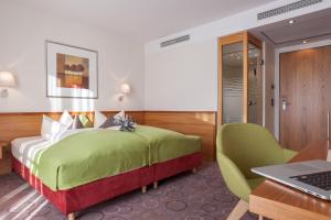 Postel nebo postele na pokoji v ubytování Hotel Waldhorn