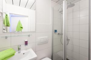 Koupelna v ubytování Hotel Waldhorn