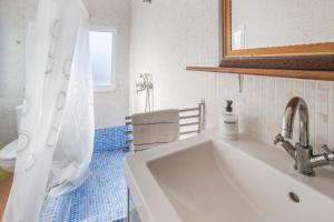 a white bathroom with a sink and a mirror at San José Moratalla in Moratalla +13 photos