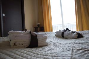 A bed or beds in a room at Il Centro Short Lets