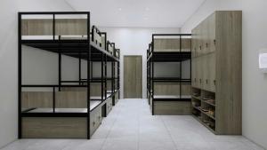 a room with wooden shelves and a walk in closet at Green Hostel Hanoi 2 in Hanoi