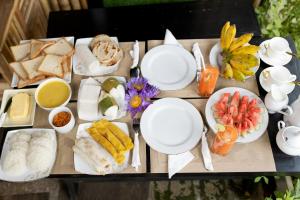 a tray filled with different types of food on a table at Rayonaz Resort in Dambulla