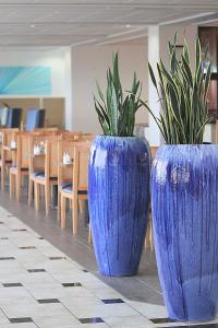 DoubleTree by Hilton Corpus Christi Beachfront的电视和/或娱乐中心