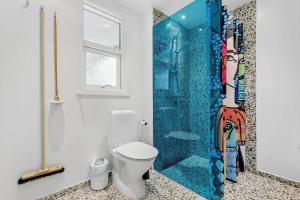 a bathroom with a toilet and a shower at 84159-Ebeltoft-Koravej-5 in Ebeltoft +18 photos