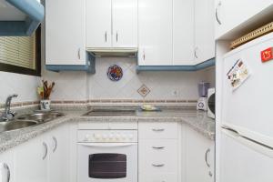 A kitchen or kitchenette at Bahia 58 Apartments Casasol