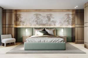 a bedroom with a bed and a painting on the wall at Campiglio PLAZA in Madonna di Campiglio +78 photos