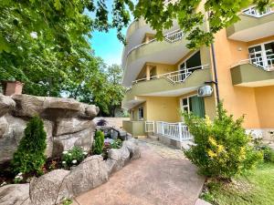 an exterior view of a building at La Zur Guest House in Ravda