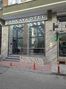 a store front of a building on a city street at Çankaya Otel in Altındağ