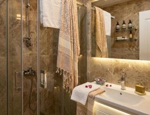 a bathroom with a shower and a sink and a shower at elisa hotel in Istanbul +22 photos