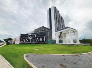 a building with a sign that reads ego santaran at The Amour Suite in Teluk Panglima Garang