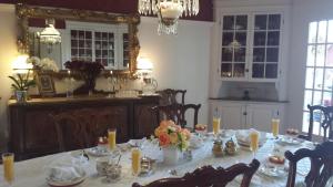 a dining room table set for a party at Historic Wilson-Guy House in Niagara-on-the-Lake