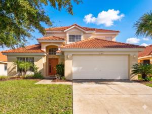 a large house with a garage at 5BR Florida villa with private pool in Davenport