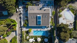 an overhead view of a house with a swimming pool at Luxury suite Portorož in Portorož