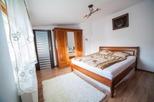 Postel nebo postele na pokoji v ubytování Dom Bory Tucholskie