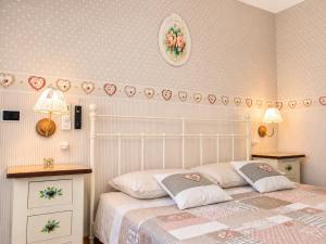 a bedroom with a bed with a white bed frame at B&B TORRE AZUL FRONTEMARE - Bisceglie in Bisceglie