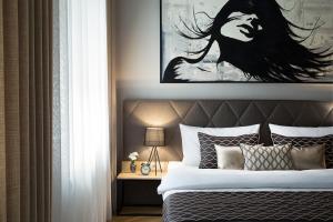 Posteľ alebo postele v izbe v ubytovaní Brill Budapest Apartments 2