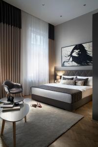 Posteľ alebo postele v izbe v ubytovaní Brill Budapest Apartments 2
