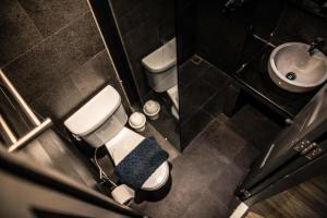an overhead view of a bathroom with a toilet and sink at JamPark City in Bangkok