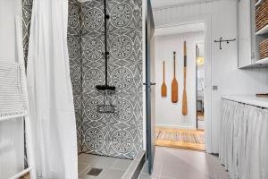 a kitchen with a door with a wall at 30116-Odder-P-Baatrupsvej-47 in Odder +28 photos