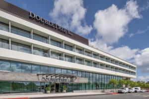 a rendering of the exterior of a building at Doubletree By Hilton Lagoa Azores in Lagoa