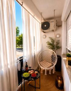 a room with a table with a bowl of fruit at Apartment "Mimoza 1" self check-in, self check-out in Otočac +25 photos