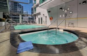 a hot tub in the middle of a building at Coast Coal Harbour Vancouver Hotel by APA in Vancouver