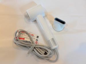 a white counter top with a hair dryer and a cord at LuxuryHOTEL難波南 in Osaka