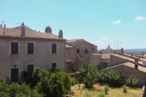 a view of an old house in a village at Casa Elisabetta in Tuscania