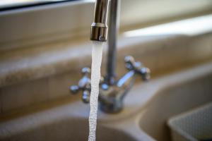 a sink with water pouring from a faucet at Casa Ginevra Capri in Capri +68 photos