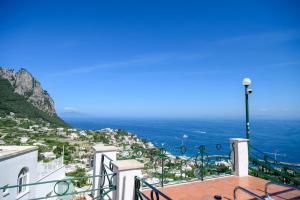 a view of the ocean from a building at Casa Ginevra Capri in Capri