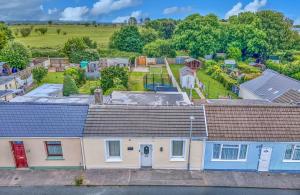 an aerial view of a house with a yard at Finest Retreats - Dockyard House in Pembroke Dock
