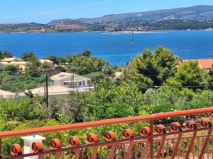 a view of the ocean from a balcony at LASSI Apartment 2 in Argostoli