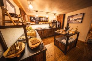 an overhead view of a kitchen with aasteryasteryasteryasteryasteryasteryasteryastery at Hôtel Neste de Jade in Saint-Lary-Soulan