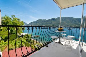 a balcony with a view of the water at Apartments Krivokapic in Perast