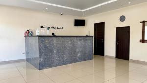 Лобі або стійка реєстрації в Bloom Hotel