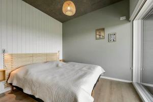 a bedroom with a bed in a room at C11319-Tarm-Multebaervej-33 in Tarm