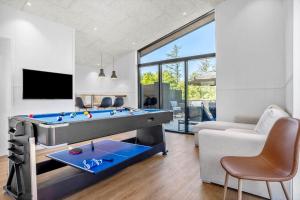 a living room with a pool table in it at LF12002-Spottrup-Molleparken-17 in Spottrup