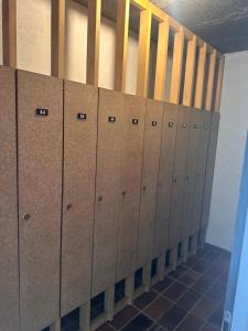 a row of lockers in a locker room at charmant studio à Morzine avec piscine privé in Morzine