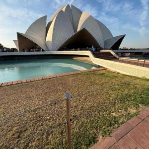 a fence in front of the sydney opera house at Airport NH Skye Suites Hotel Terminal 3, Delhi International Airport With - Free Airport Pickup in New Delhi