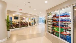 a pharmacy aisle with bikes on the shelves at SeaStays Apartments in Miami Beach