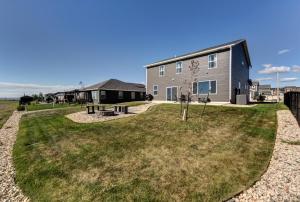 a yard with a house and a playground at Executive Stay for Work & Family in Rapid City