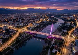 an aerial view of a bridge over a river at Nexus Apartment in Podgorica