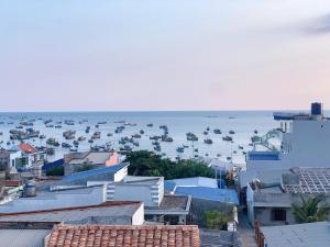 a view of a harbor with boats in the water at CoCo SEA in Mui Ne