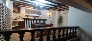 a kitchen and a dining room with a table and a dining room gmaxwell gmaxwell gmaxwell at Villa Golden Coast - Lagos in Lagos
