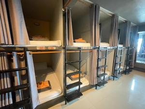 a row of dressing rooms with their doors open at Bann Lhong Rak Krabi in Krabi