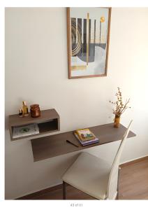 a desk with a shelf on a wall at Royal Welcome Casanearshore B&B in Casablanca +11 photos