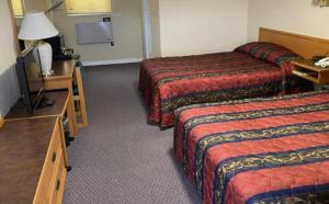 Televiisor ja/või meelelahutuskeskus majutusasutuses Skyways Motel Muskoka Gravenhurst ON 11