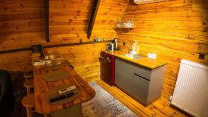 an overhead view of a kitchen in a log cabin at Vice Suit Bungalov in Sapanca