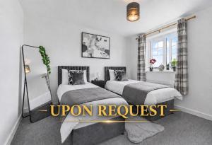 a bedroom with two beds with the words open request at The Mersey Sanctuary in Liverpool