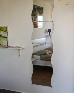 a room with a bunk bed and a wall at Apartment with parking in Dajla